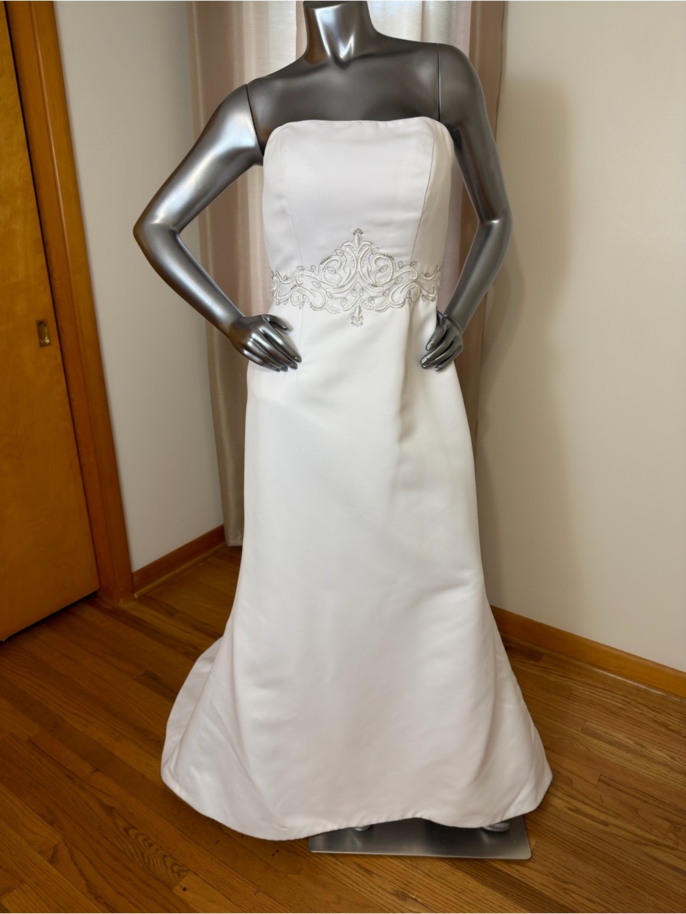 David's Bridal White Strapless Satin A-Line Wedding Dress with Beaded Waist.
